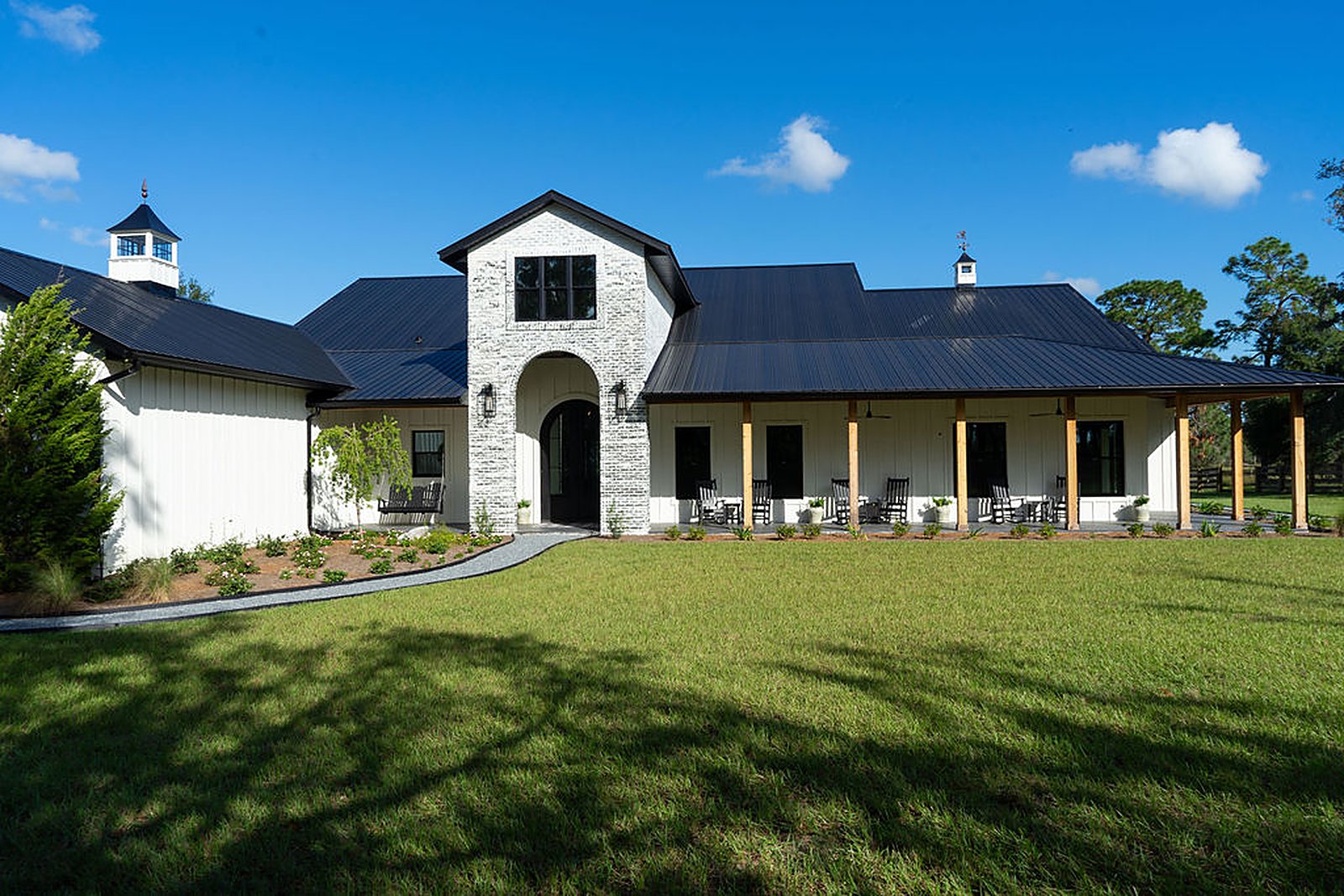 Modern farmhouse estate — exterior, built by Great Oaks General Contractors