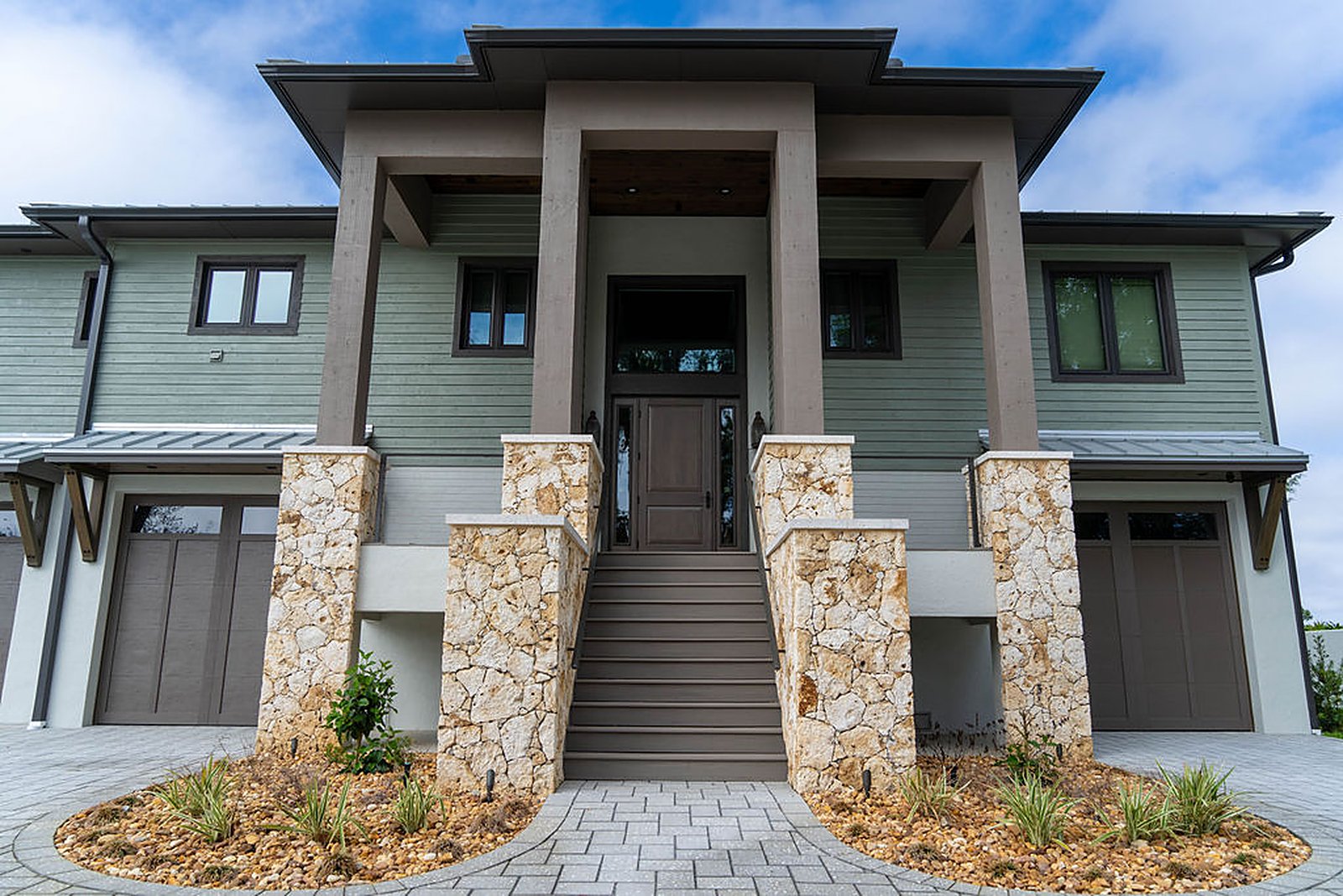 Elevated coastal residence — exterior, built by Great Oaks General Contractors