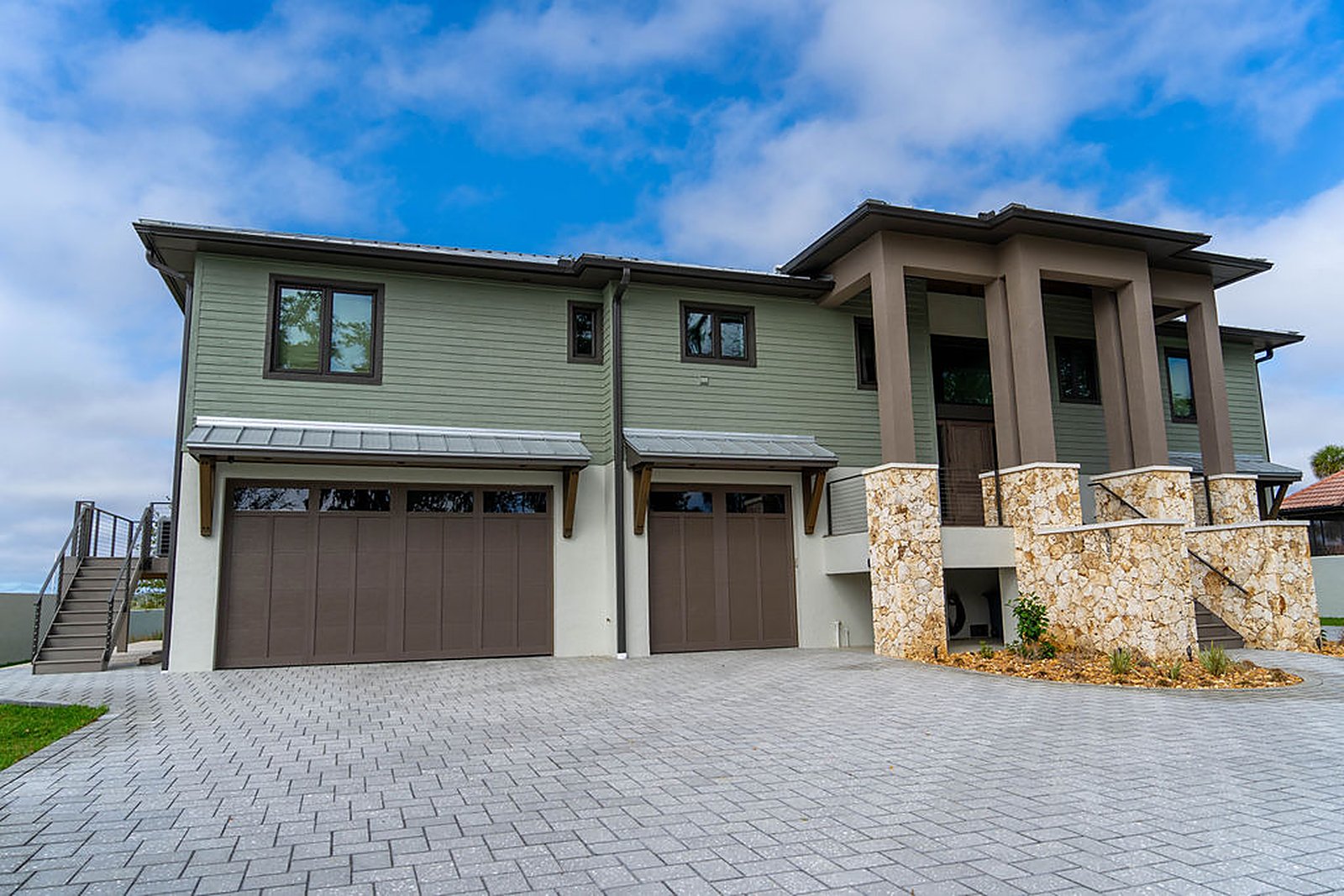 Elevated coastal residence — exterior, built by Great Oaks General Contractors