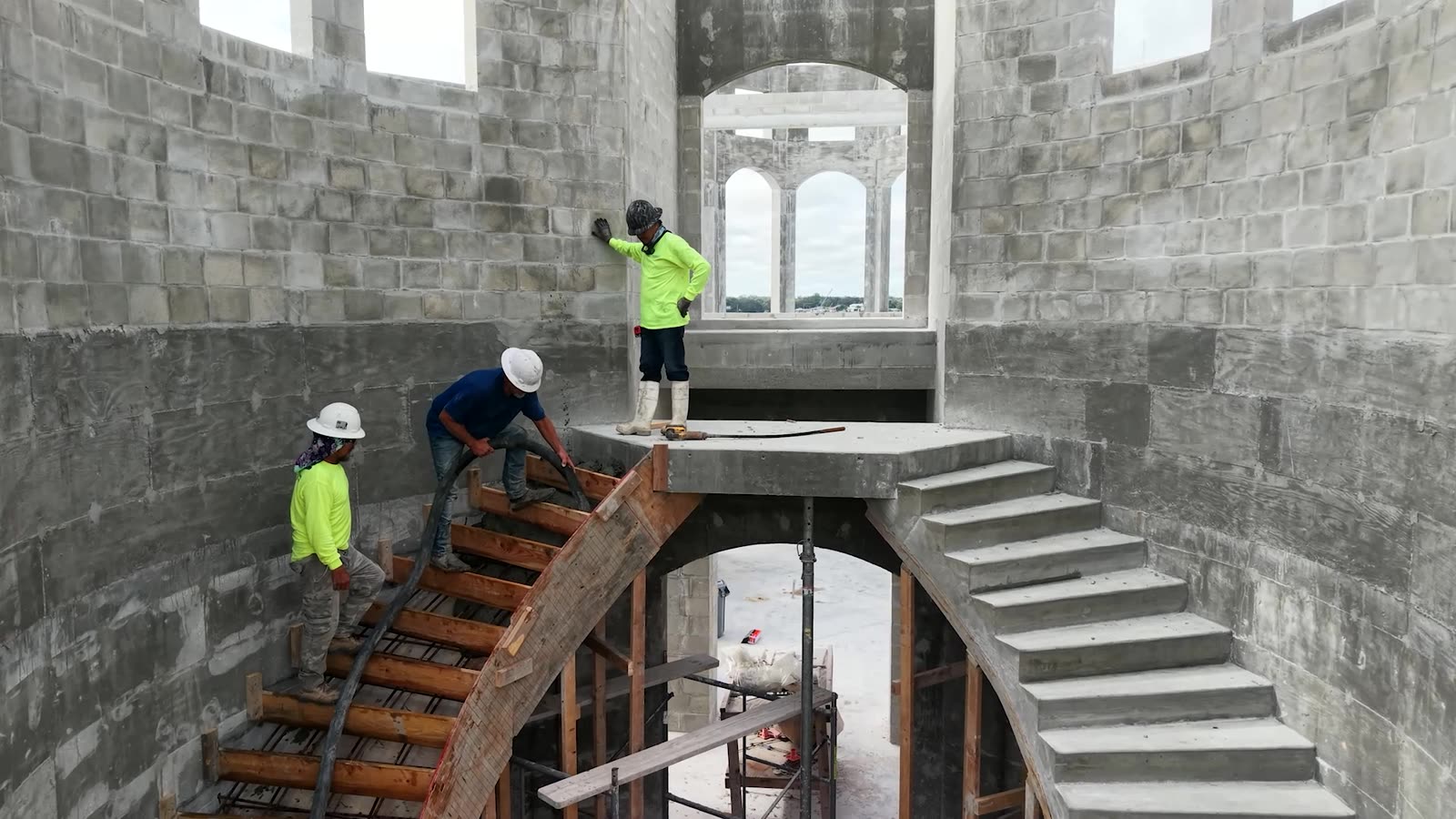 Crew pouring the concrete stair